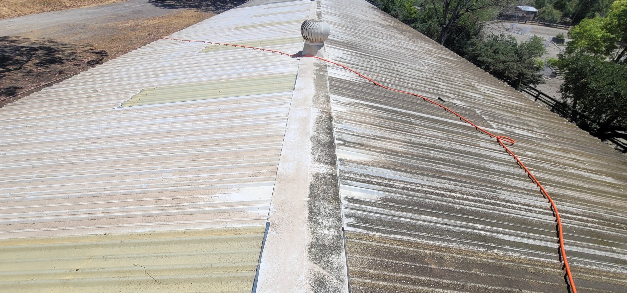 Metal roof washing